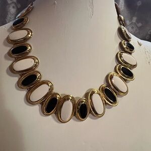 Elegant Gold and Black Necklace by Source Unknown